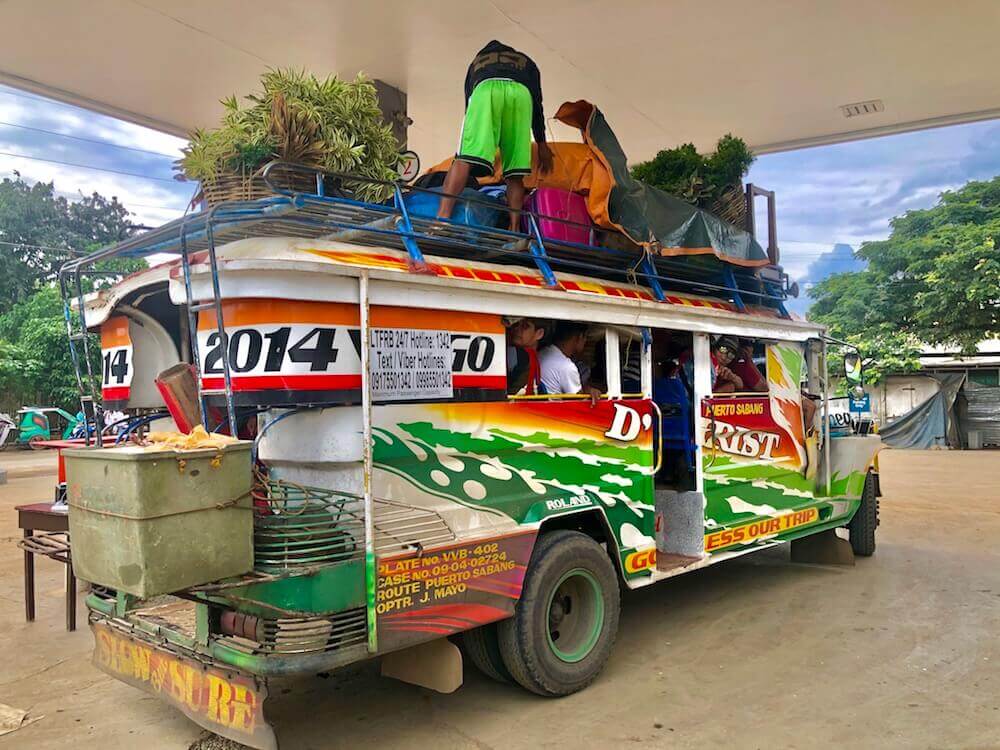Culture: Jeepneys are colourful small buses that you can flag down anywhere. They can be overpacked though, having literally people hanging out on the outside and sitting on the roof. On this ride, I counted over 45 people.
