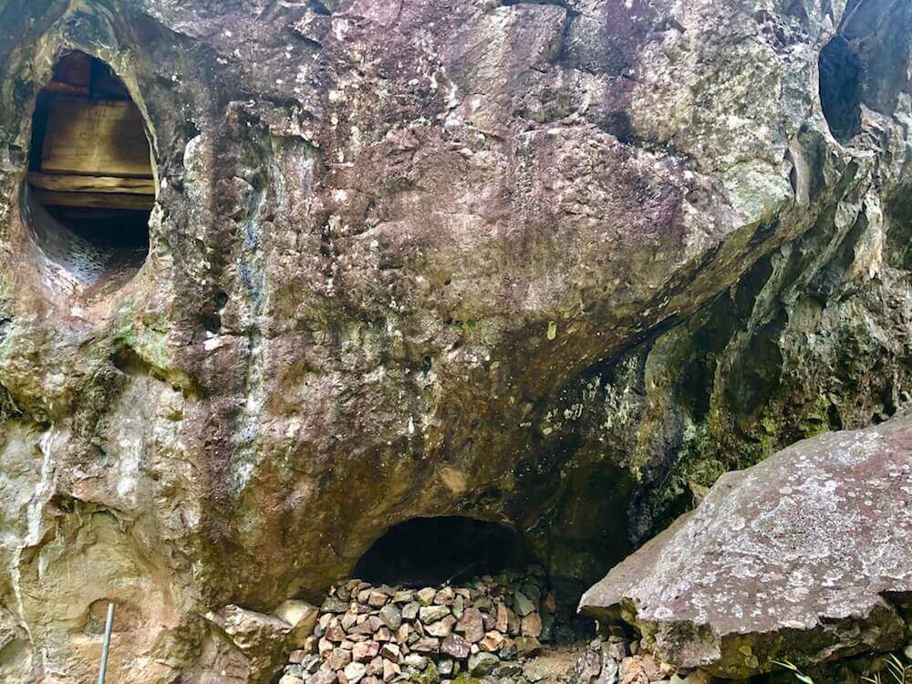 Kabayan, Luzon: Tinongchol Burial Rock is an ancestral burial site dating 150-250 years. Imagine a huge boulder with about 18 holes which hold about 7-8 coffins each that have actual mummies in it. On the left hole, you can still see some untouched coffins.
